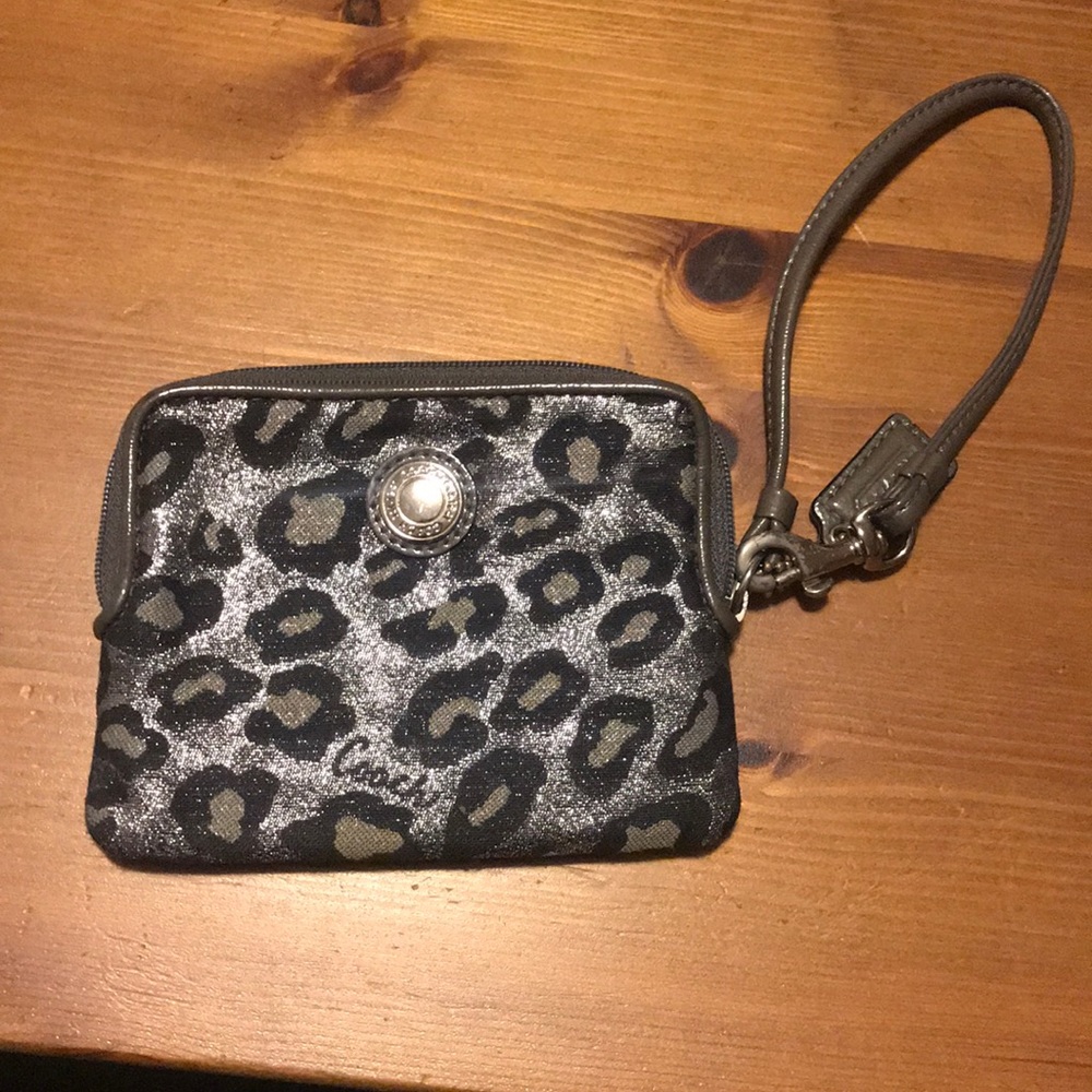 Coach cheetah print wristlet.